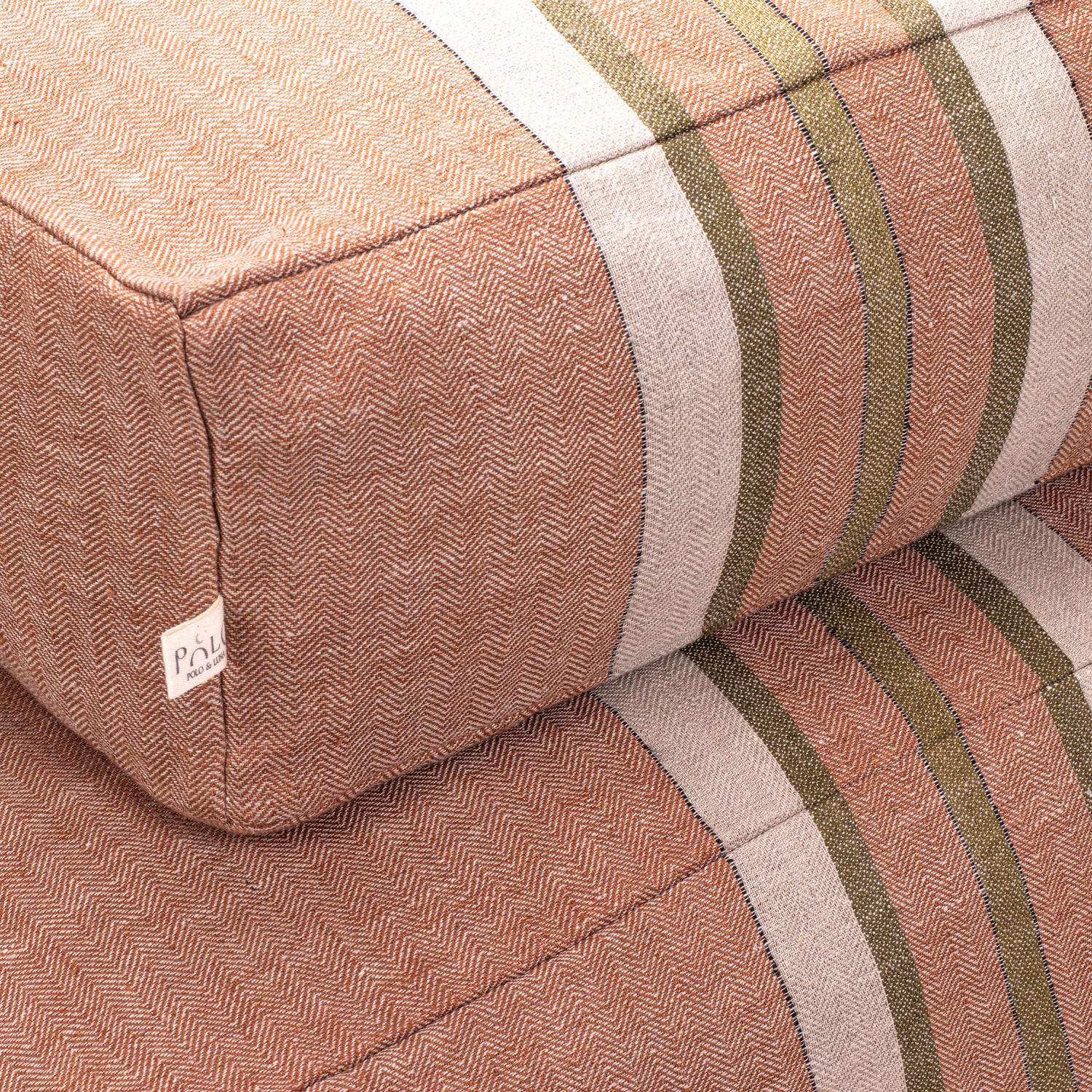 detail close up of chestnut + olive green stripes, floor cushion dog beds